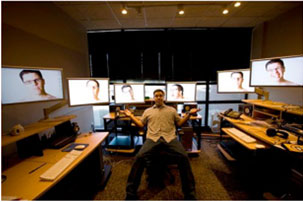 a unique 7 monitor setup with independant articulated lcd monitor arms